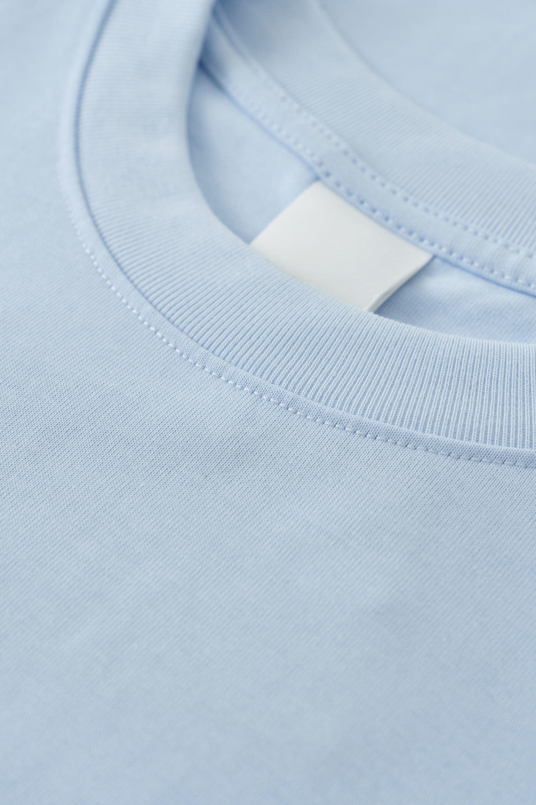 Light Blue t-shirt collar close-up - reinforced stitching for durability