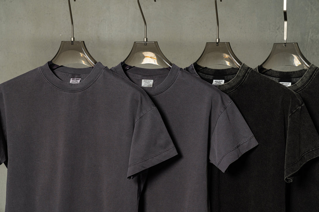 Hanger display of Women's 100% Cotton Oversized Tee in Dark Gray, showing garment drape for bulk orders.