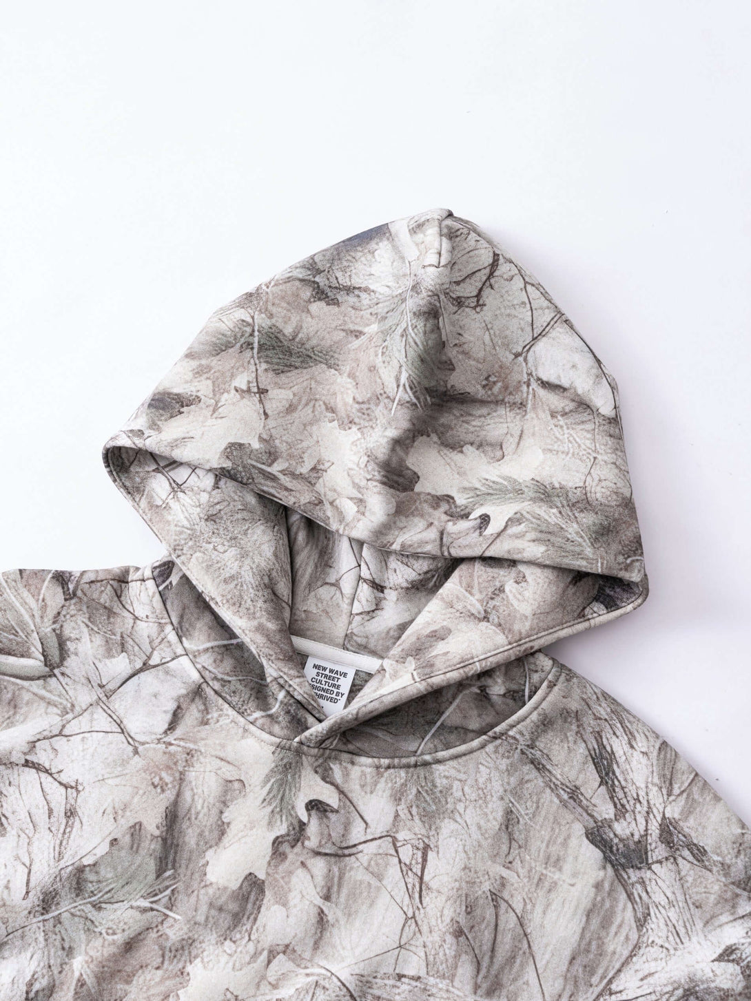 Men's Woodland Camo Hoodie showcasing the intricate heat transfer print and durable fabric of the hooded sweatshirt.