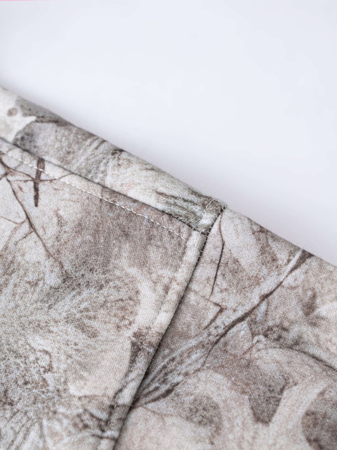 Men's 340g Woodland Camo Zip Up Hoodie showing close-up of durable fabric and stitching details.